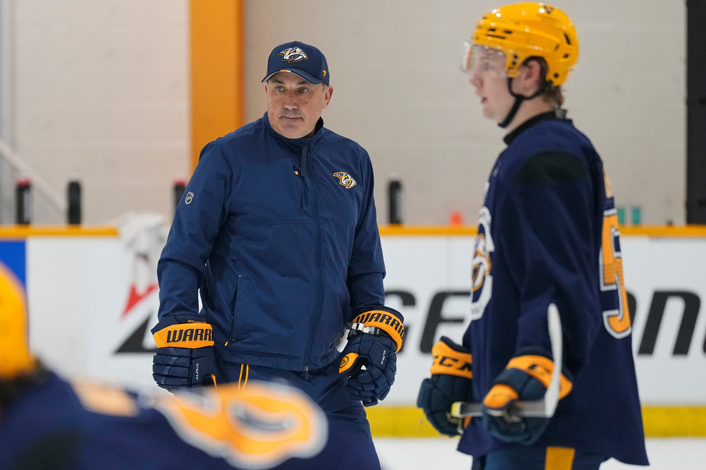 Nashville Predators head coach Andrew Brunette watches his players during NHL hockey training camp Thursday, Sept. 17, 2026, in Nashville, Tenn. (AP Photo/George Walker IV)