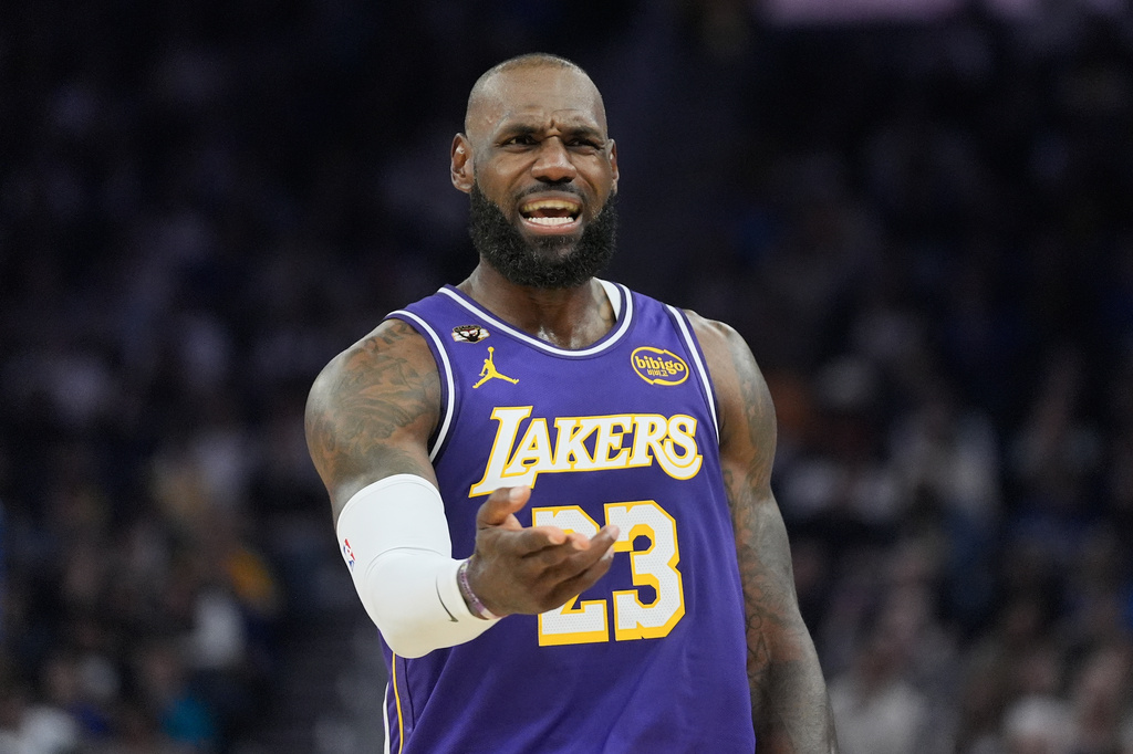 Los Angeles Lakers forward LeBron James (23) reacts during the first half of an NBA basketball game against the Golden State Warriors in San Francisco, Thursday, April 9, 2026. (AP Photo/Jeff Chiu)
