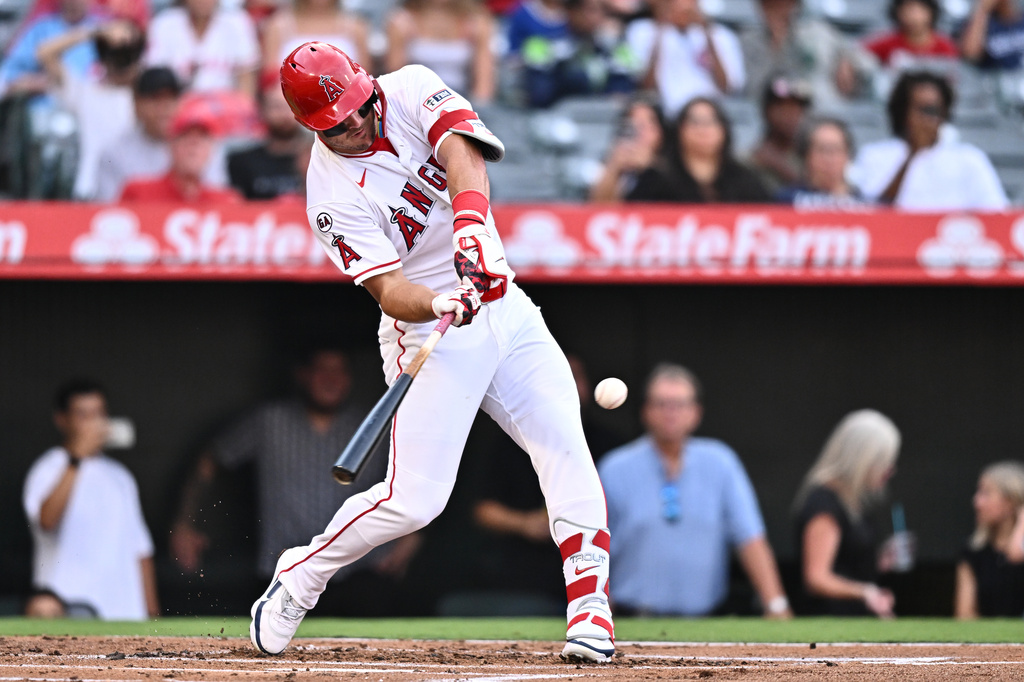 Los Angeles Angels' Mike Trout hits a home run during the first inning of a baseball game against the Texas Rangers, Monday, Aug. 10, 2026, in Anaheim, Calif. (AP Photo/William Liang)