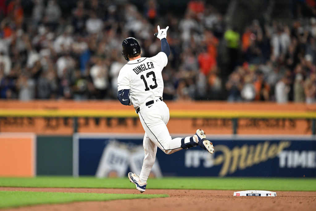 Detroit Tigers' Dillon Dingler reacts after hitting a two-run home run during the sixth inning of a baseball game against the Colorado Rockies, Friday, Sept. 11, 2026, in Detroit. (AP Photo/Jose Juarez)