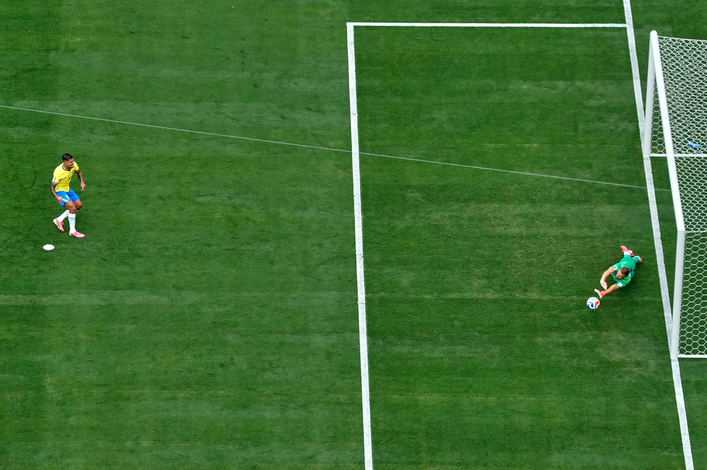 Norway goalkeeper Oerjan Nyland (1) saves a penalty from Brazil's Bruno Guimaraes (8) during the World Cup round of 16 soccer match between Brazil and Norway in East Rutherford, N.J., near New York, Sunday, July 5, 2026. (AP Photo/Stephen K.H. Moyes)