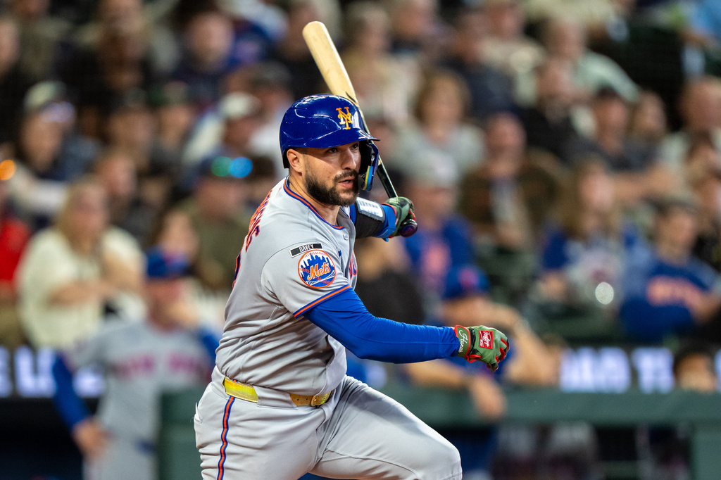 New York Mets' Luis Torrens hits a double during the eighth inning of a baseball game against the Seattle Mariners, Wednesday, June 3, 2026, in Seattle. (AP Photo/Stephen Brashear)
