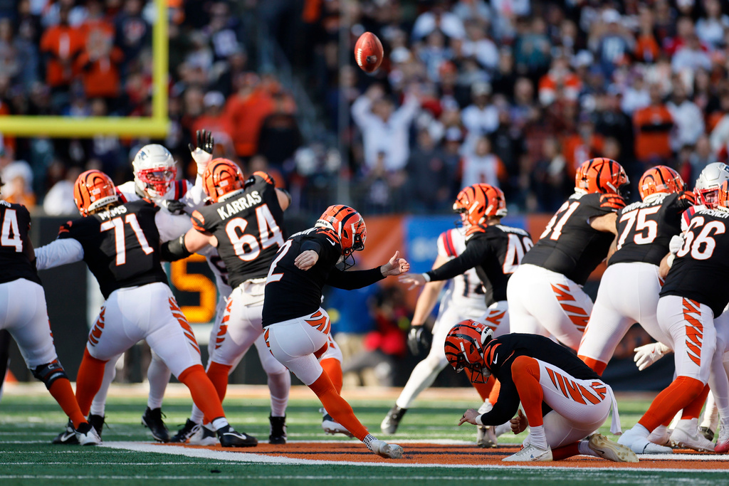 Cincinnati Bengals place kicker Evan McPherson (2) kicks a 63-yard field goal during the first half of an NFL football game against the New England Patriots, Sunday, Nov. 23, 2025, in Cincinnati. (AP Photo/Jay LaPrete)