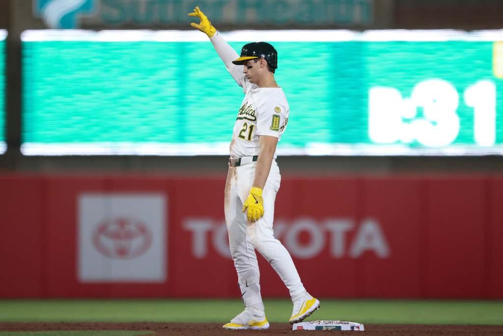Athletics' Tyler Soderstrom reacts after hitting an RBI double during the fifth inning of a baseball game against the Houston Astros Tuesday, Sept. 23, 2025, in West Sacramento, Calif. (AP Photo/Scott Marshall)