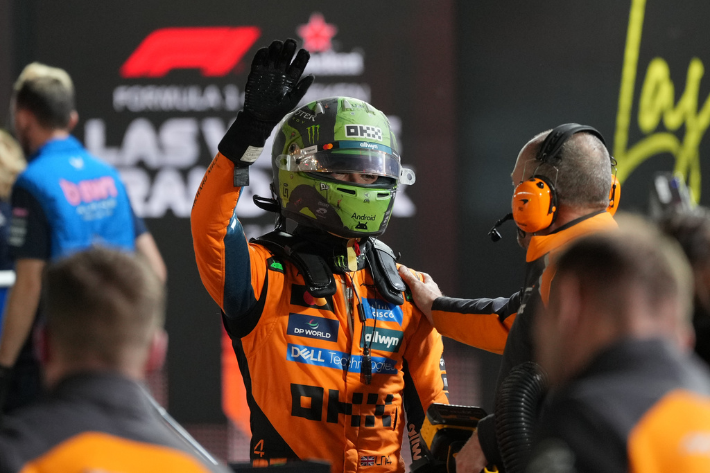 McLaren driver Lando Norris of Great Britain celebrates after a qualifying session at the Formula One Las Vegas Grand Prix auto race, Friday, Nov. 21, 2025 in Las Vegas. (AP Photo/Eric Gay)