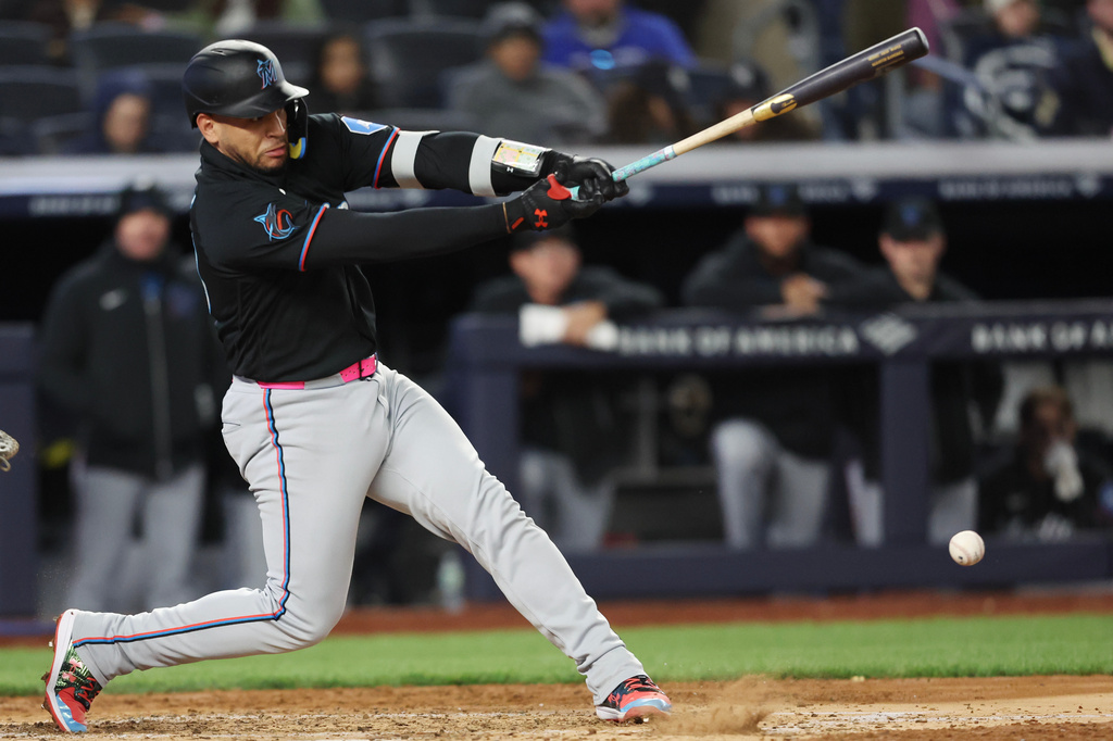Miami Marlins catcher Agustín Ramírez connects for a single during the fourth inning of a baseball game against the New York Yankees, Saturday, April 4, 2026, in New York. (AP Photo/Heather Khalifa)