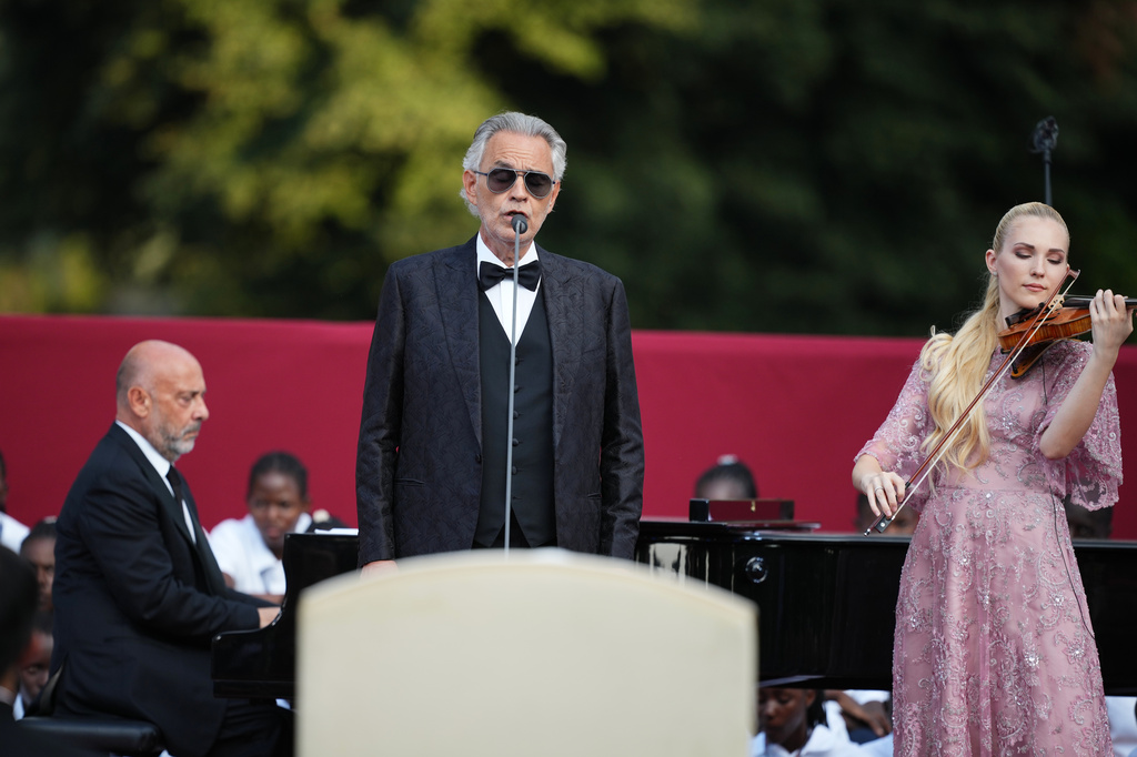 FILE -Italian singer Andrea Bocelli performs during the "Canticle of Peace" prayer and fraternity meeting with Pope Leo XIV at Borgo Laudato Si' in Castel Gandolfo, about 30 kilometers (19 miles) southwest of Rome, Italy, July 29, 2026. (AP Photo/Alessandra Tarantino, File)