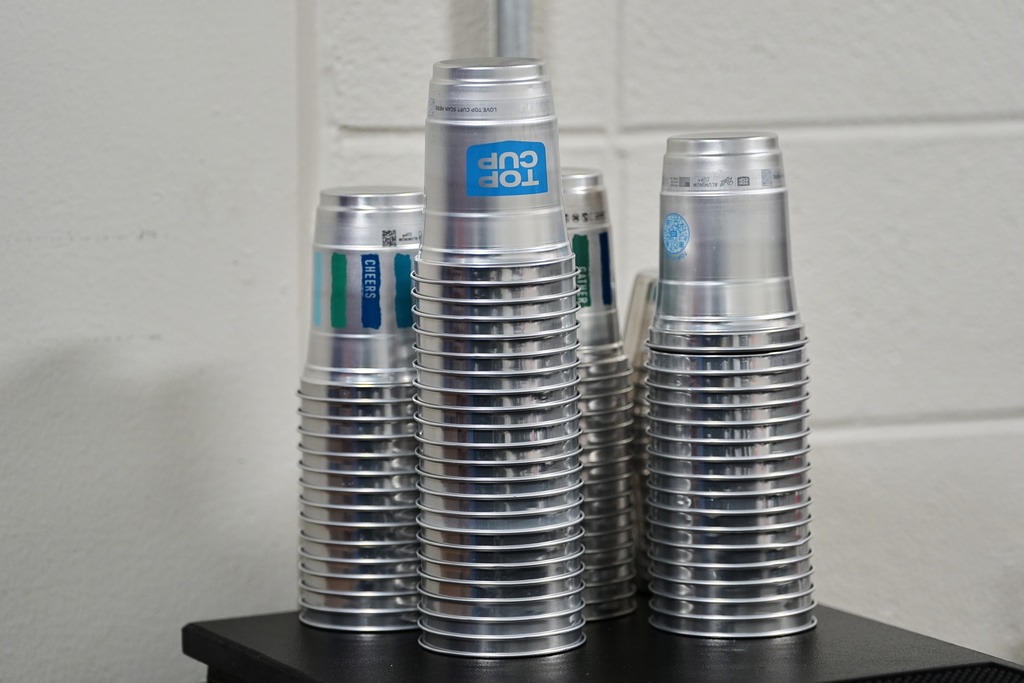 Aluminum cups are stacked during an NFL football game in Philadelphia, Sunday, Sept. 21, 2025. (AP Photo/Matt Rourke)