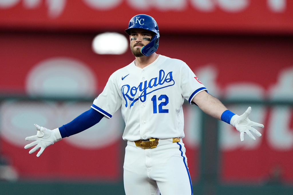 Kansas City Royals' Nick Loftin celebrates on second after hitting a two-run double during the fourth inning of a baseball game against the St. Louis Cardinals, Thursday, June 18, 2026, in Kansas City, Mo. (AP Photo/Charlie Riedel)