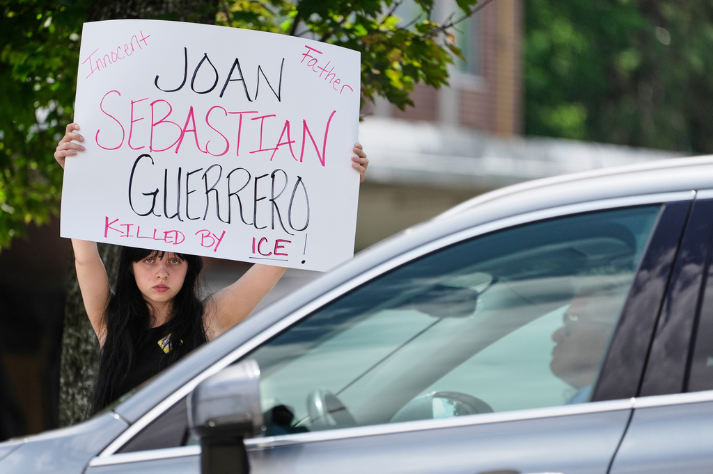A young woman protests against U.S. Immigration and Customs Enforcement in the wake of the killing of Johan Sebastián Durán Guerrero, Thursday, July 16, 2026, in Augusta, Maine. (AP Photo/Robert F. Bukaty)