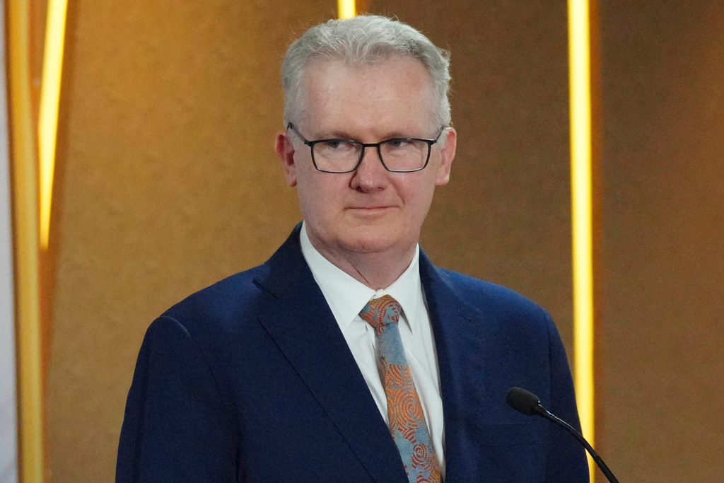 FILE - Australian Home Affairs Minister Tony Burke, right, listens to Indonesian Coordinating Minister for Legal, Human Rights, Immigration and Correctional Affairs, Yusril Ihza Mahendra, during a news conference after their meeting in Jakarta, Indonesia, Dec. 3, 2024. (AP Photo/Tatan Syuflana, File)