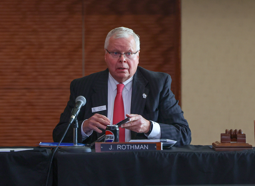 FILE - University of Wisconsin System President Jay Rothman prepares his materials before a UW Board of Regents meeting on Sept. 18, 2025, at Gordon Commons at UW-Madison in Madison, Wis. (Owen Ziliak/Wisconsin State Journal via AP, File)