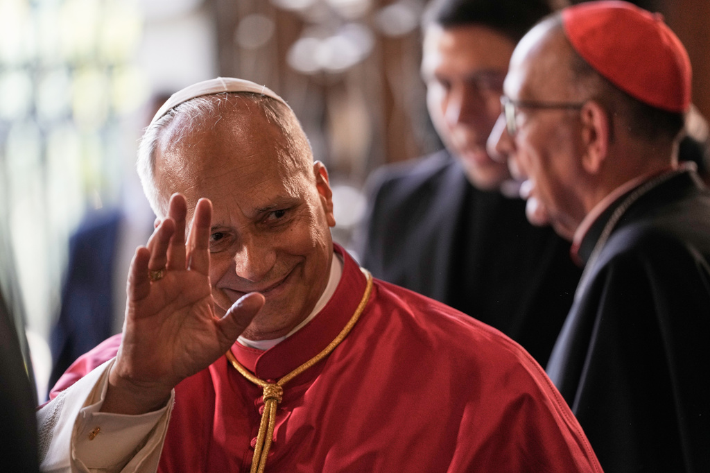 Pope Leo XIV waves as he leaves after presiding over a midday prayer at the Cathedral of the Holy Cross and Saint Eulalia in Barcelona, Spain, Tuesday, June 9, 2026. (AP Photo/Bernat Armangue)