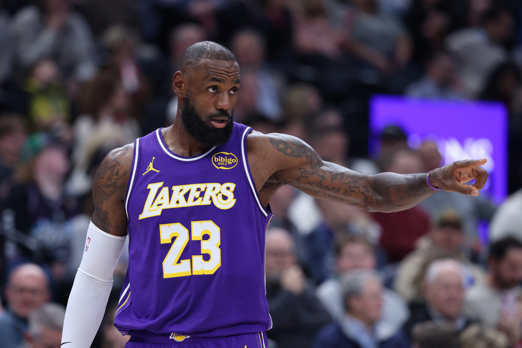 Los Angeles Lakers forward Lebron James reacts after a play against the Utah Jazz during the first quarter of an NBA basketball game, Thursday, Dec. 18, 2025, in Salt Lake City. (AP Photo/Rob Gray)