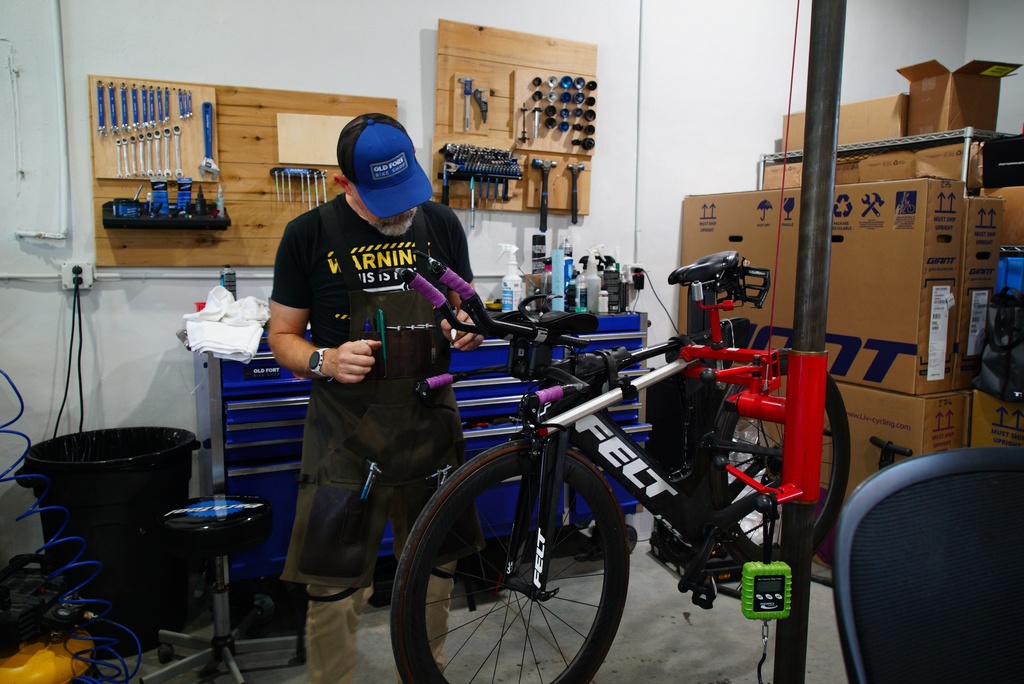 Chad Schoenauer works in his bike shop in Old Fort, N.C., on Thursday, Sept. 1, 2025. (AP Photo/Allen G. Breed)