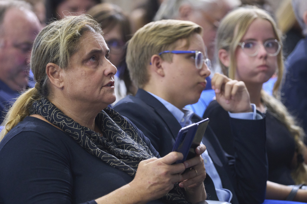 From left, the mother of Blessed Carlo Acutis, Antonia, with her children Michele and Francesca attend the screening of the film 'Carlo Acutis, roadmap to reality' at Rome's Pontifical North American College, Friday, Sept. 5, 2025. (AP Photo/Domenico Stinellis)