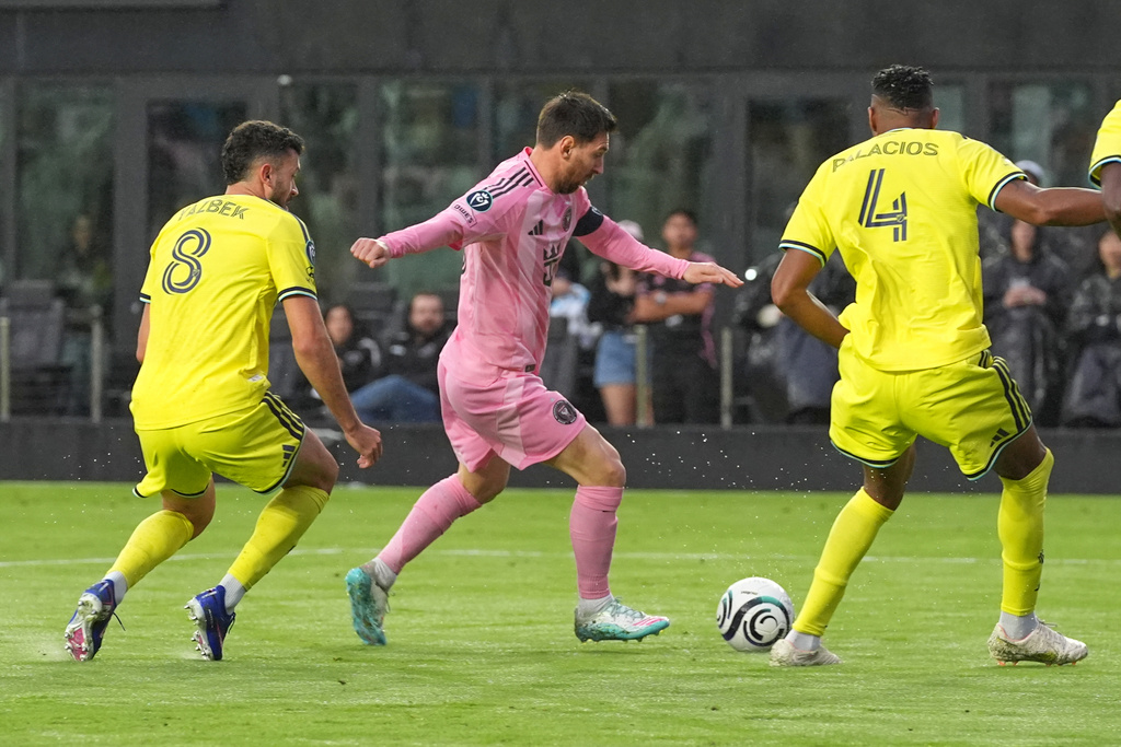 Inter Miami forward Lionel Messi (10) aims to score his 900th goal during a CONCACAF Champions Cup Round of 16 soccer match against Nashville, Wednesday, March 18, 2026, in Fort Lauderdale, Fla. (AP Photo/Marta Lavandier)
