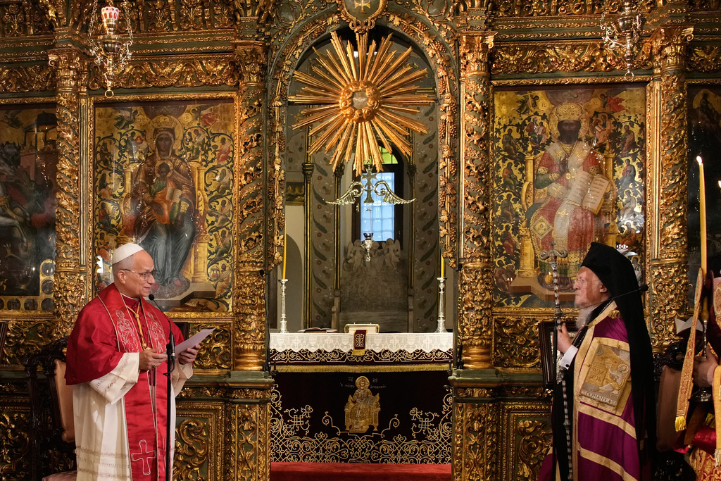 Pope Leo XIV and Ecumenical Patriarch Bartholomew I, the spiritual leader of the world's Eastern Orthodox Christians attend the Doxology at the Patriarchal Church of Saint George, in Istanbul, Turkey, Saturday, Nov. 29, 2025. (AP Photo/Emrah Gurel)
