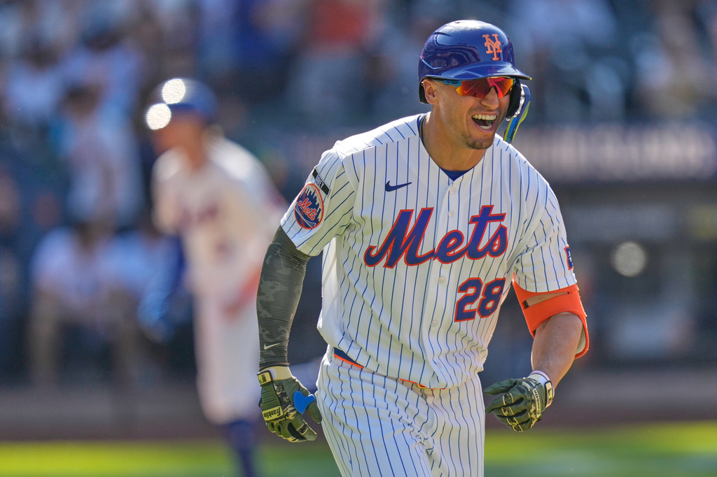 New York Mets' Tyrone Taylor reacts after hitting a three-run home run during the ninth inning of a baseball game against the New York Yankees, Sunday, May 17, 2026, in New York. (AP Photo/Seth Wenig)