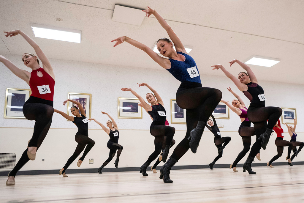 FILE - Dancers perform during auditions to become Radio City Rockettes at Radio City Music Hall, on April 3, 2024, in New York. (AP Photo/Brittainy Newman, File)