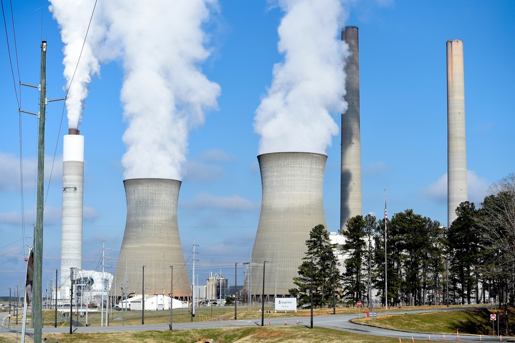 FILE - Plant Bowen, commonly known as Bowen Steam Plant, is a Coal power station, operating, Monday, Dec. 14, 2020, in Euharlee, Ga. (AP Photo/Mike Stewart, File)