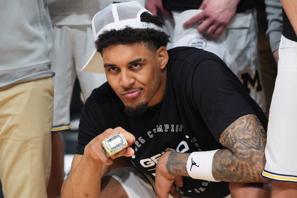 Michigan forward Yaxel Lendeborg poses with his MVP trophy after Michigan defeated Gonzaga in an NCAA college basketball game in the Players Era tournament in Las Vegas, Wednesday, Nov. 26, 2025. (AP Photo/Eric Gay)