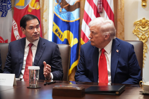 President Donald Trump looks on as Secretary of State Marco Rubio speaks during a cabinet meeting at the White House, Thursday, Oct. 9, 2025, in Washington. (AP Photo/Evan Vucci) President Donald Trump looks on as Secretary of State Marco Rubio speaks during a cabinet meeting at the White House, Thursday, Oct. 9, 2025, in Washington. (AP Photo/Evan Vucci)