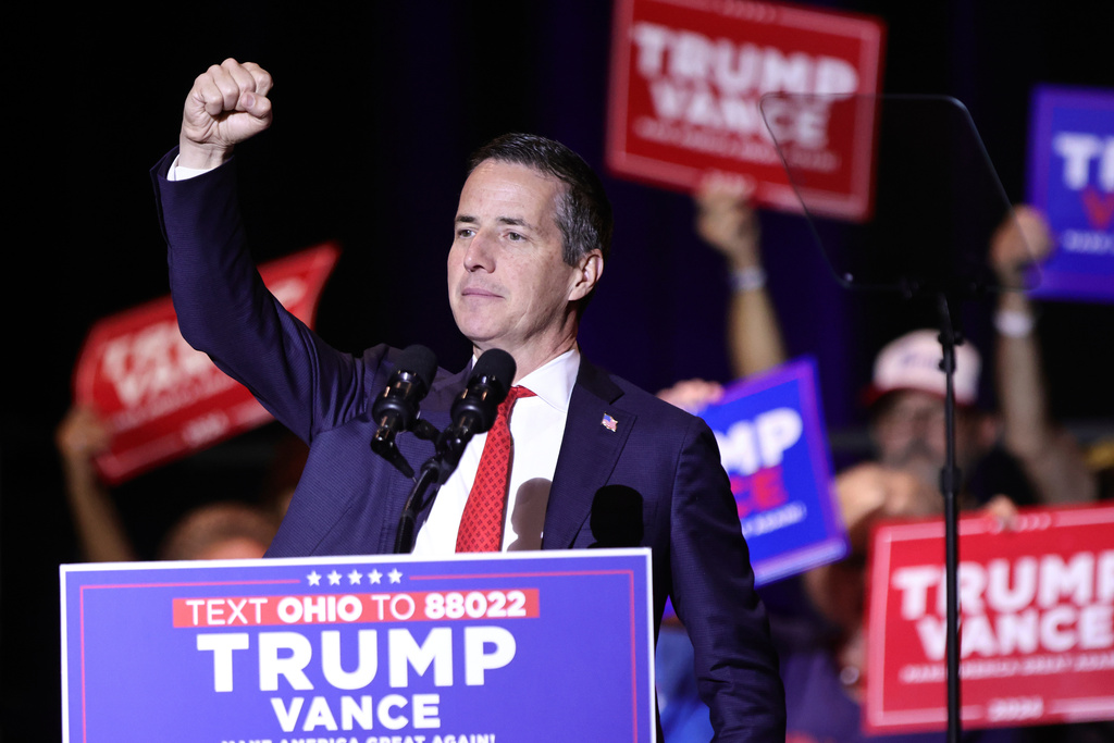 Ohio Republican Senate candidate Bernie Moreno raises his right fist during a rally for Republican vice presidential candidate Sen. JD Vance, R-Ohio, in Middletown, Ohio, July 22, 2024. (AP Photo/Paul Vernon, File)