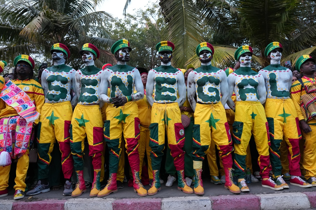 Fans celebrate the Senegalese soccer team's victory in the Africa Cup of Nations soccer tournament, in Dakar, Senegal, Tuesday, Jan. 20, 2026. (AP Photo/Misper Apawu)