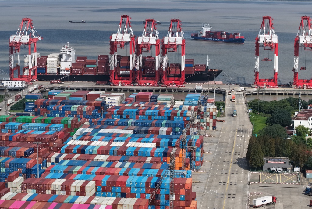 An aerial view of a container terminal in Shanghai, China, Monday, Dec. 8, 2025. (Chinatopix Via AP)