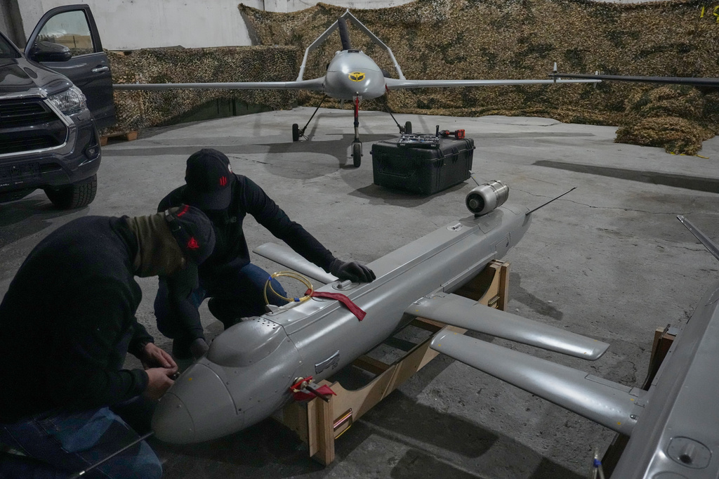 Servicemen of Ukraine's defense intelligence set up the Peklo (Hell) missile drone against Russian in an undisclosed location in Ukraine late Thursday, May 28, 2026. (AP Photo/Efrem Lukatsky)