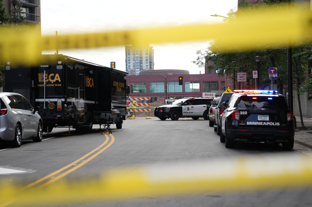 Police continue to investigate the scene of a Wednesday shooting at Shoreline Plaza apartments, Thursday, Sept. 3, 2026, in Minneapolis. (AP Photo/Ellen Schmidt) CORRECTION: Shoreline, not Shoreview