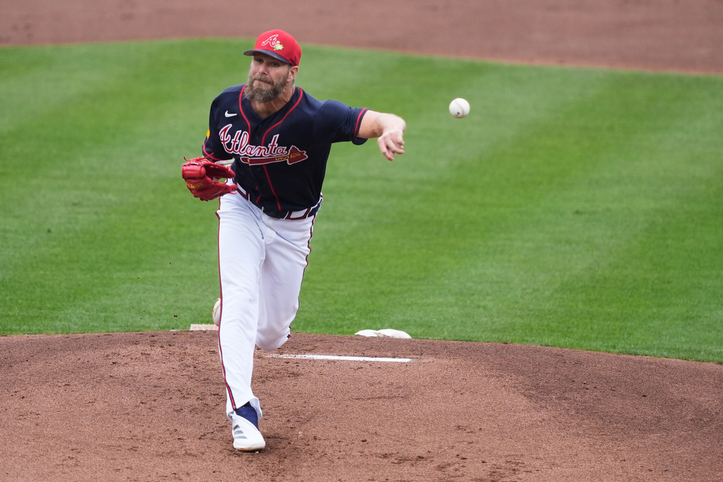 Atlanta Braves pitcher Chris Sale delivers in the first inning of a spring training baseball game against the Minnesota Twins in North Port, Fla., Sunday, Feb. 22, 2026. (AP Photo/Gerald Herbert)