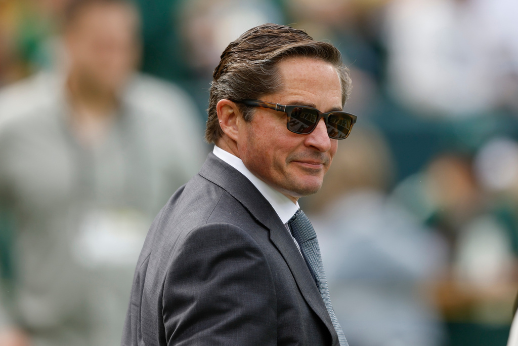 FILE - Green Bay Packers president Ed Policy walks on the field before a NFL football game against the Detroit Lions on Sept. 7, 2025, in Green Bay, Wis. (AP Photo/Jeffrey Phelps, File)