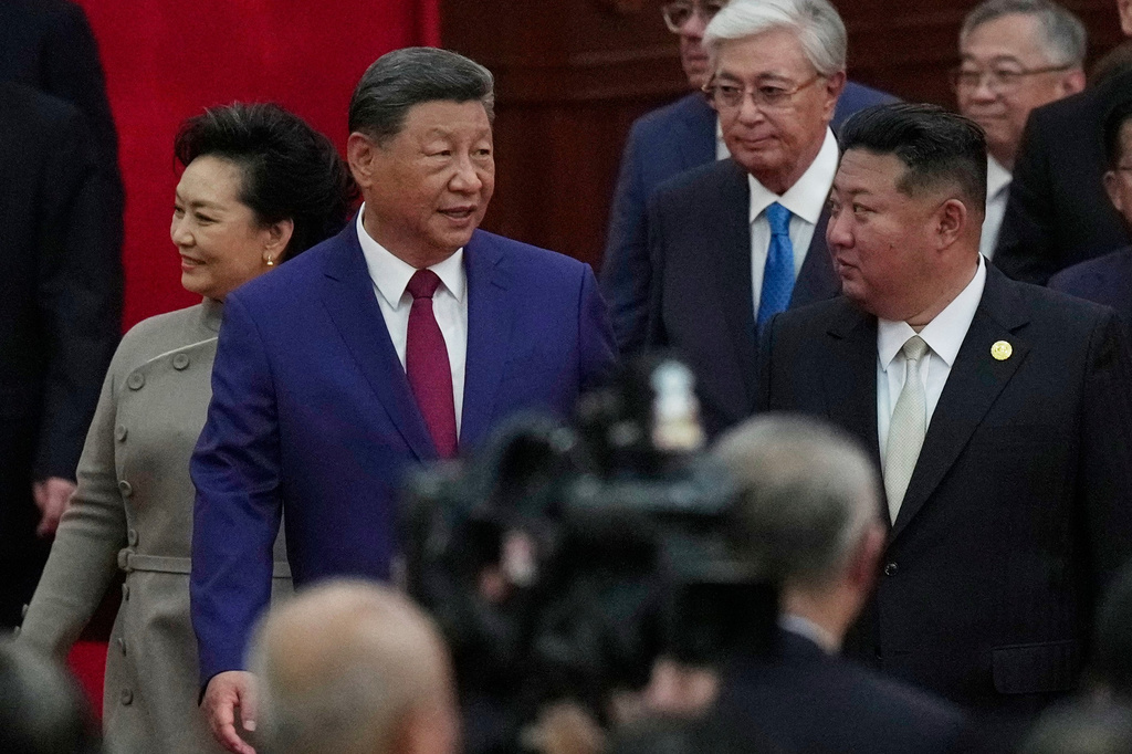FILE - Chinese President Xi Jinping walks with North Korean leader Kim Jong Un, right, to a reception following a military parade to commemorate the 80th anniversary of Japan's World War II surrender held in front of Tiananmen Gate in Beijing, Wednesday, Sept. 3, 2025. (AP Photo/Mahesh Kumar, File)