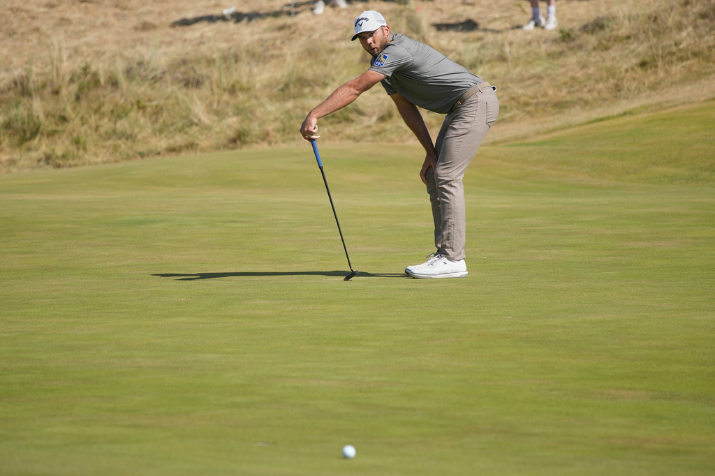 Sam Burns of the United States reacts after missing a put on the 8th green during the final day of the British Open Golf championships at Royal Birkdale golf club, in Southport, England, Sunday, July 19, 2026. (AP Photo/David Goldman)