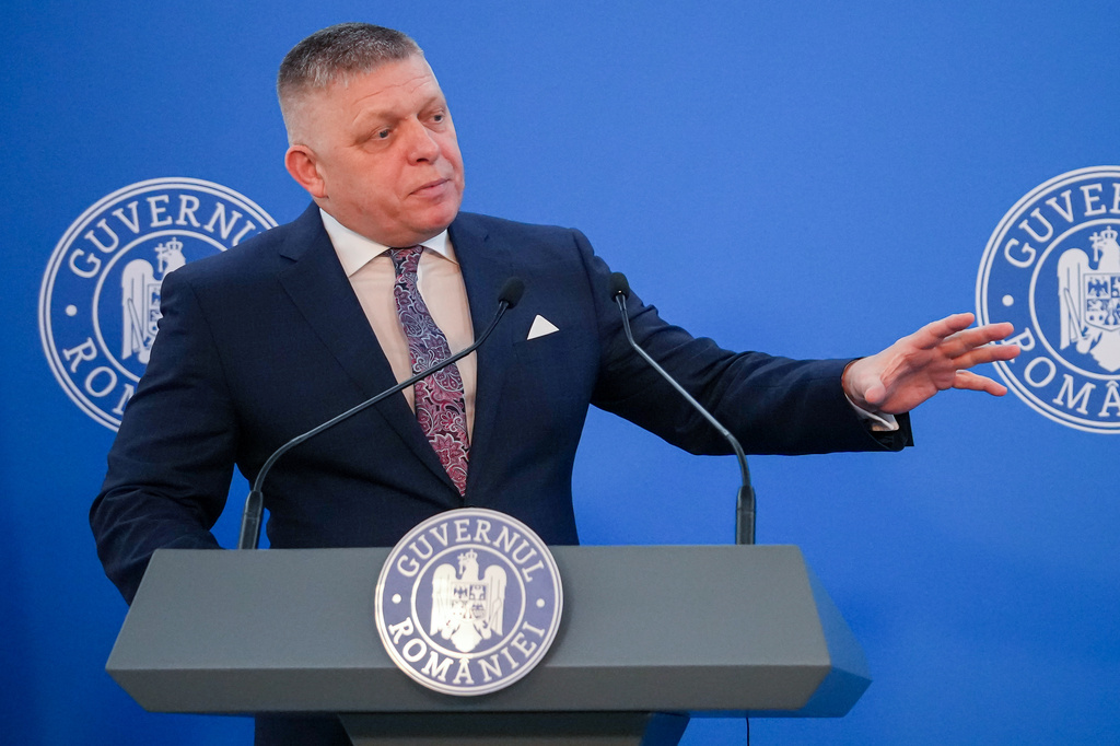 Slovakia's Prime Minister Robert Fico gestures during joint statements with Romanian counterpart Ilie Bolojan, at the Victoria Palace, the Romanian government headquarters in Bucharest, Romania, Friday, March 27, 2026. (AP Photo/ Vadim Ghirda)