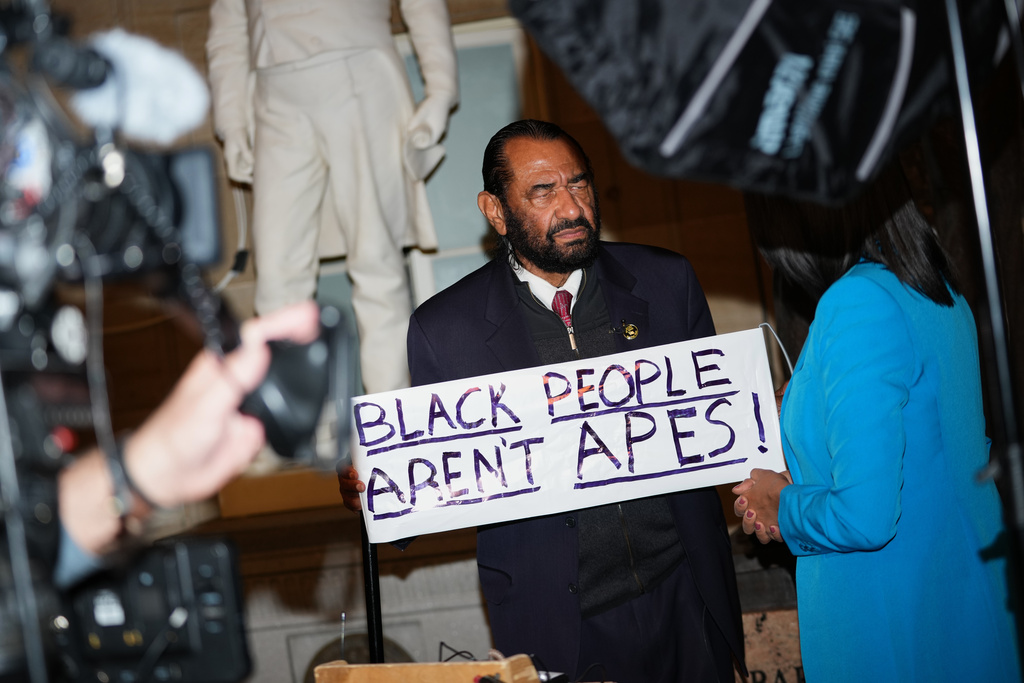 Rep. Al Green, D-Texas, speaks to the press after being escorted out of President Donald Trump's State of the Union address to a joint session of Congress in the House chamber at the U.S. Capitol in Washington, Tuesday, Feb. 24, 2026. (AP Photo/Allison Robbert)