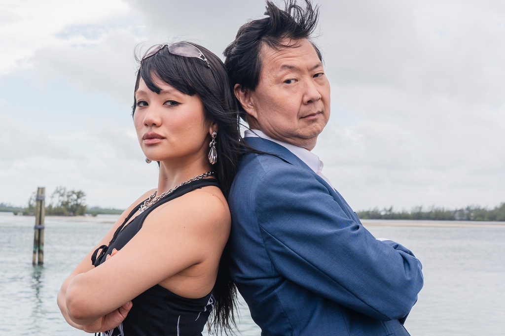 This image released by Discovery Channel shows KPop singer Rei Ami, left, and actor-comedian Ken Jeong who appear in “K-Pop Shark Heroes," kicking off Discovery's annual "Shark Week." (Tito Herrera/Discovery Channel via AP)