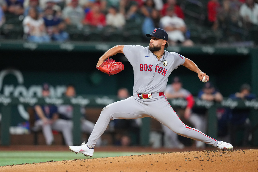 Boston Red Sox starting pitcher Patrick Sandoval throws to the Texas Rangers during the second inning of a baseball game Tuesday, Sept. 15, 2026, in Arlington, Texas. (AP Photo/Julio Cortez)