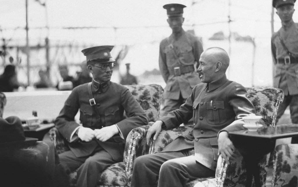 FILE - General Chiang Kai-shek, right, head of the Nanking government at Canton for his alleged laxity in challenging Japan for the latter's encroachment on Chinese sovereignty is shown with General Lung Yun, chairman of the Yunan provincial government in Nanking, June 27, 1936. (AP Photo, File)