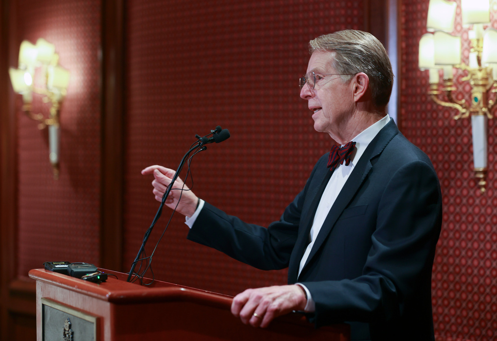 Jim McConkie, Parker & McConkie attorney and founder, speaks at a press conference after Salt Lake County District Attorney Sim Gill announced that manslaughter charges have been filed against Matt Alder for the fatal shooting of Arthur Folasa Ah Loo, who was an innocent bystander at a "No Kings" rally, at the Little America Hotel, in Salt Lake City, Wednesday, Dec. 3, 2025. (Kristin Murphy/The Deseret News via AP)