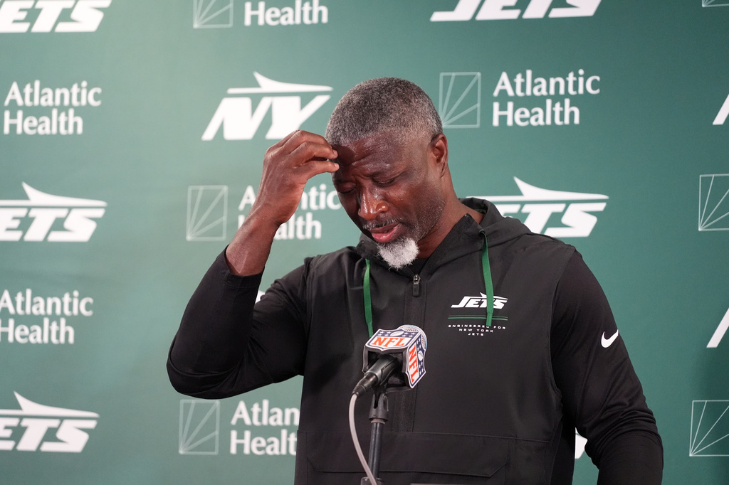 New York Jets head coach Aaron Glenn speaks during a news conference following an NFL football game against the Chicago Bears Sunday, Oct. 4, 2026, in Chicago. (AP Photo/David Banks)