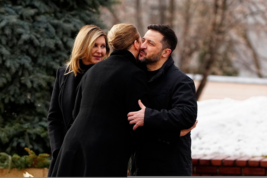 Denmark's Prime Minister Mette Frederiksen, centre, is welcomed by Ukraine's President Volodymyr Zelenskyy and his wife Olena Zelenska, left, before a service at St. Sophia Cathedral in Kyiv, Ukraine, on Tuesday, Feb. 24, 2026. (Mads Claus Rasmussen/Ritzau Scanpix via AP)