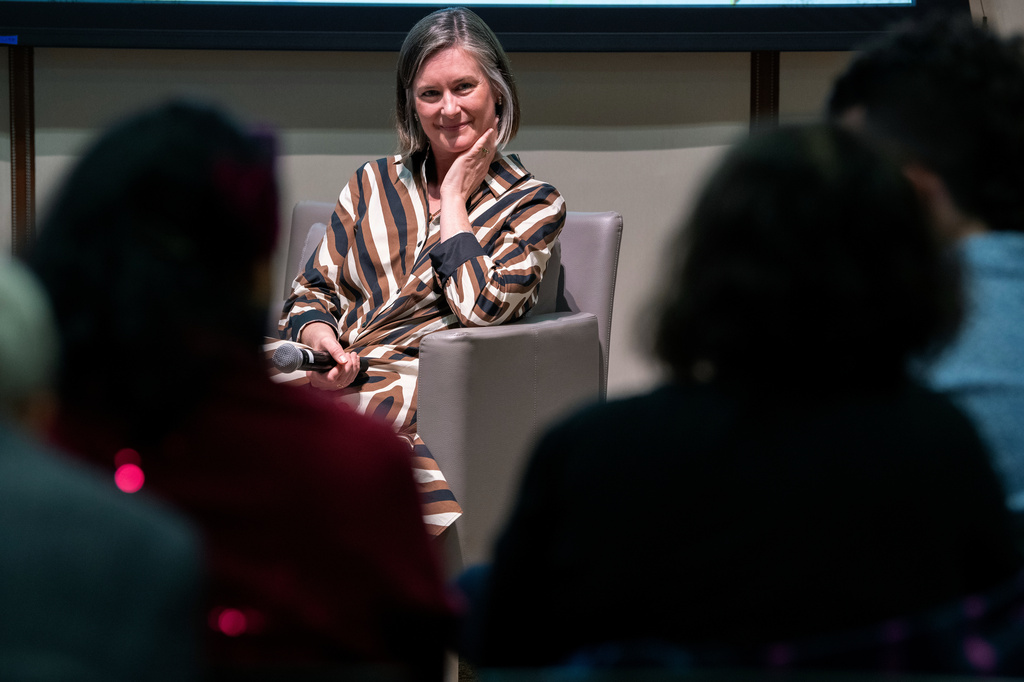 Katharine Wilkinson gives a talk about living with climate uncertainty at American University in Washington on April 14, 2026. (AP Photo/Michael Phillis)