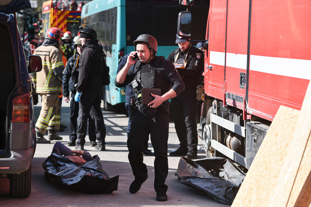 Police inspect a body recovered from the rumble of a residential building destroyed by a Russian strike, in Dnipro, Ukraine, Saturday, April 25, 2026. (AP Photo/Mykola Synelnykov)