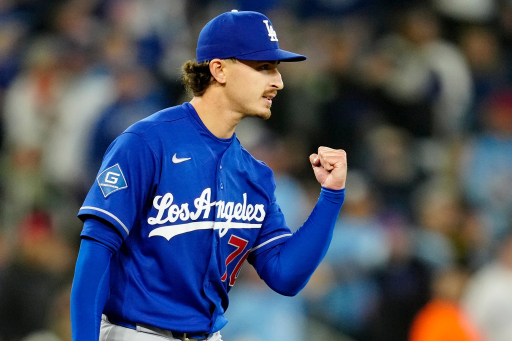 Los Angeles Dodgers pitcher Justin Wrobleski pumps his fist after a fly ball hit by Toronto Blue Jays' Vladimir Guerrero Jr. was caught during first-inning baseball game action in Toronto, Monday, April 6, 2026. (Frank Gunn/The Canadian Press via AP)
