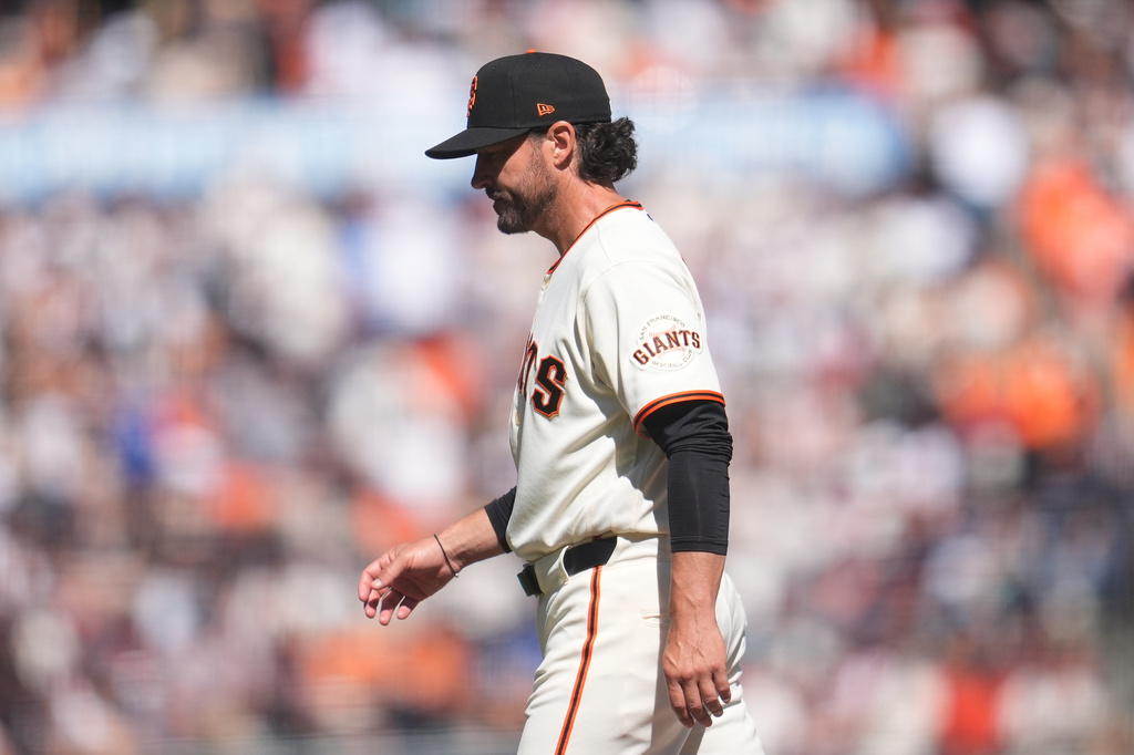 San Francisco Giants manager Tony Vitello walks to the dugout after making a pitching change during the sixth inning of a baseball game against the New York Yankees in San Francisco, Friday, March 27, 2026. (AP Photo/Jeff Chiu)