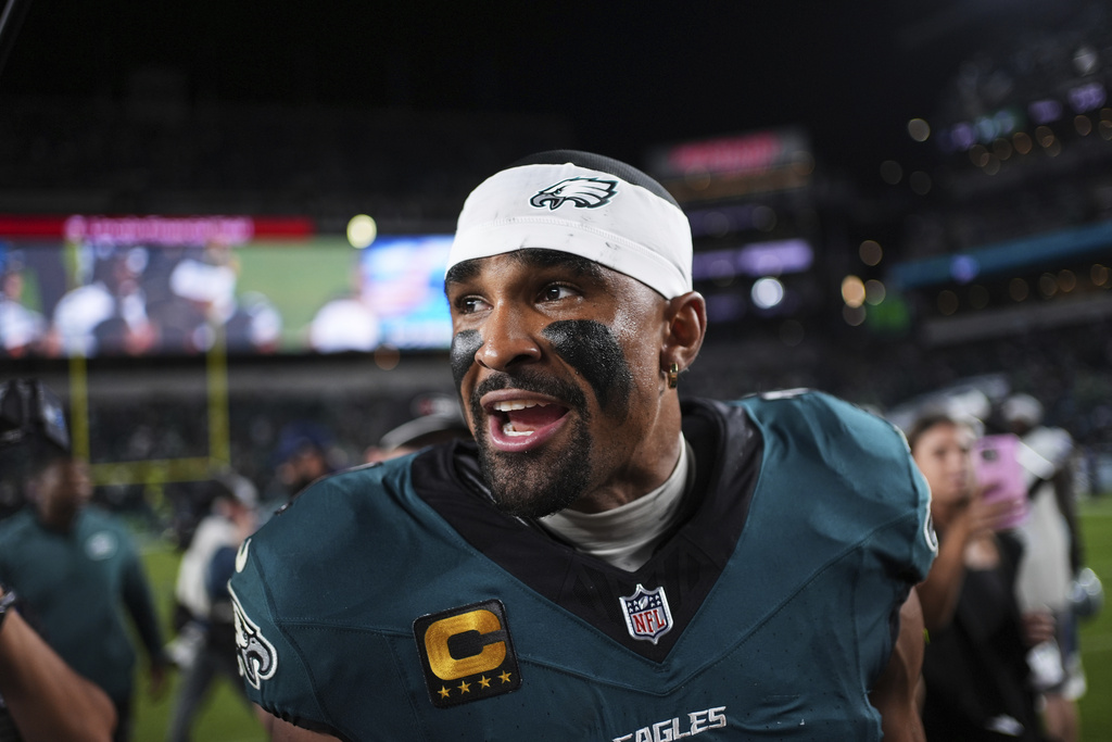 Philadelphia Eagles' Jalen Hurts celebrates the team's win in an NFL football game against the Dallas Cowboys Friday, Sept. 5, 2025, in Philadelphia. (AP Photo/Matt Slocum)