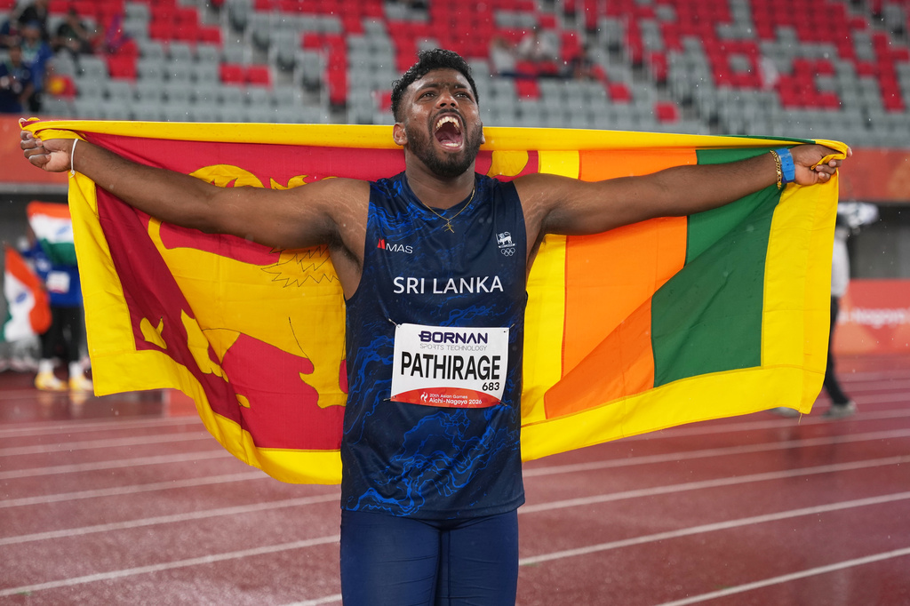 Sri Lanka's Rumesh Pathirage celebrates after winning the men's javelin throw final, at the Asian Games in Nagoya, Japan, Monday, Sept. 28, 2026. (AP Photo/Lee Jin-man)